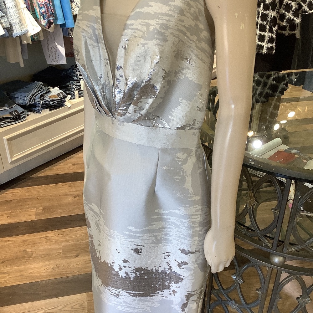 Perfect silver print Italian poly cocktailformal dress. Plunging neckline front